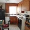 Our new tumbled marble countertop in kitchen of Cottage #4