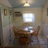 Cottage 5 Dining area featuring new wainscoting