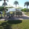 View of the West Patio for Bayside Dining with a Grill